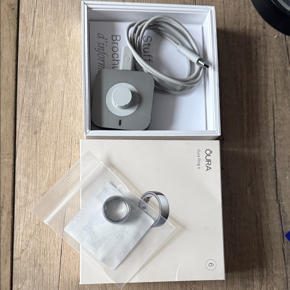Oura Ring Charger and Silver Accessory with White Cable